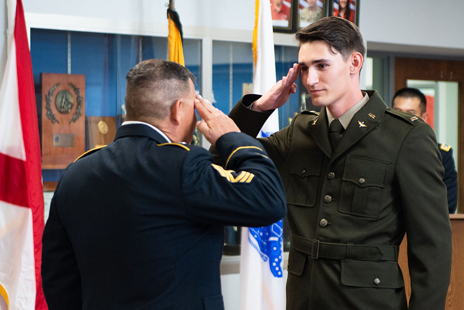 A soldier Saluting his commanding officer